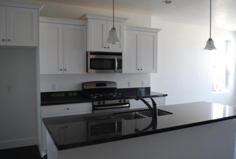 kitchen in home located at 10224 S Willamette Way Daybreak