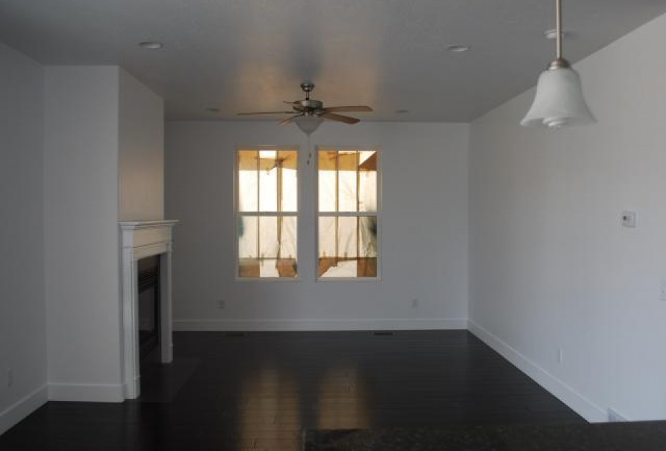 Living Room  in home located at 10224 S Willamette Way Daybreak